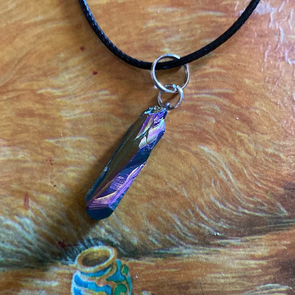 Rare find Fire rainbow quartz crystal pendant with black cord